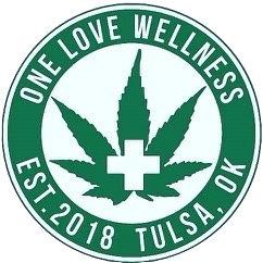 A green and white logo with a marijuana leaf.